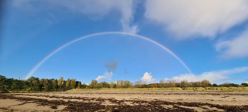 A rainbow over a Cornish beach