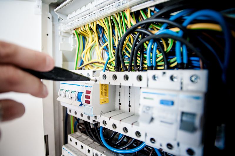 Testing a distribution board during an electrical inspection